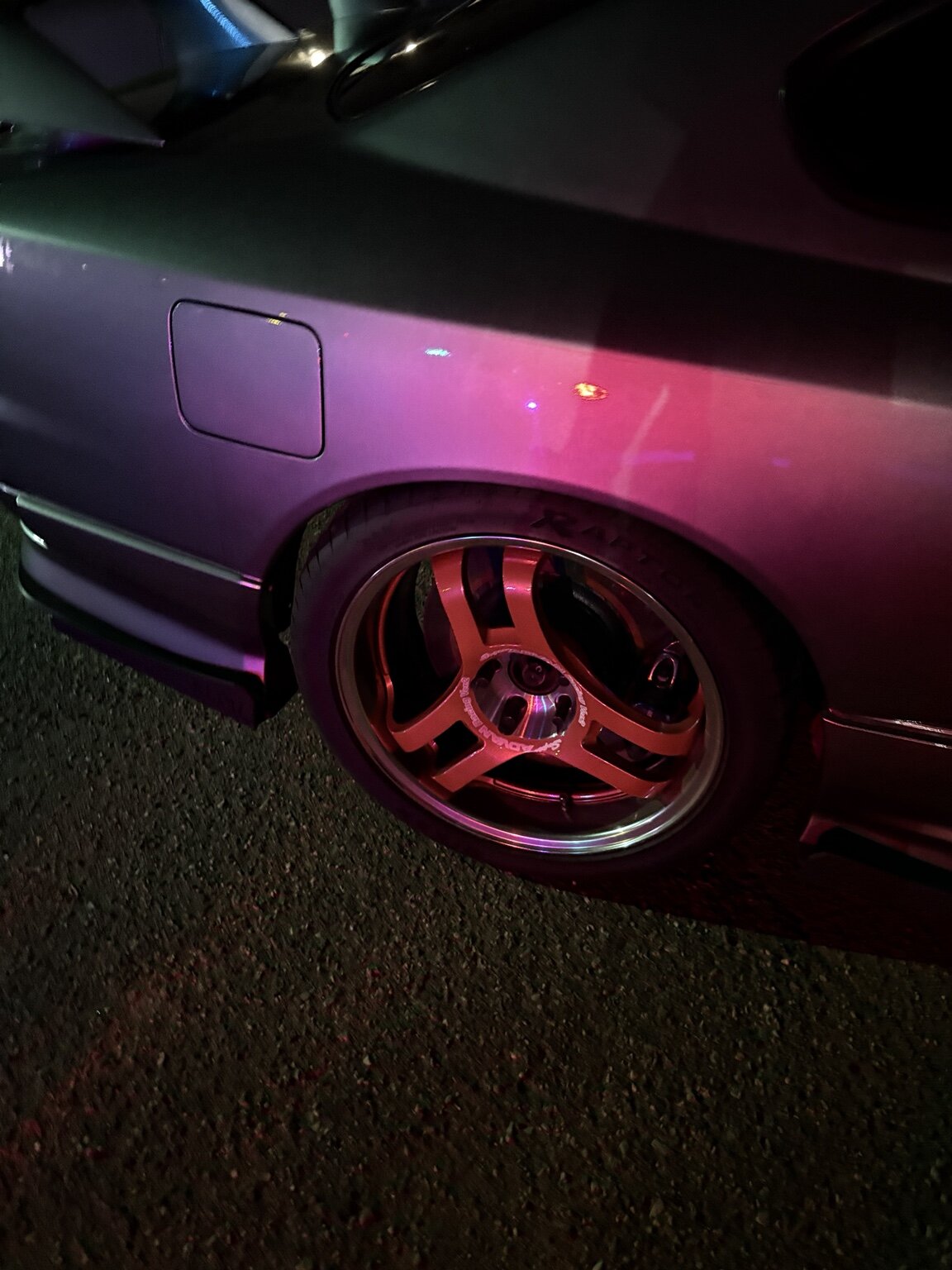 Close-up of the real S15’s red wheel and rear quarter panel